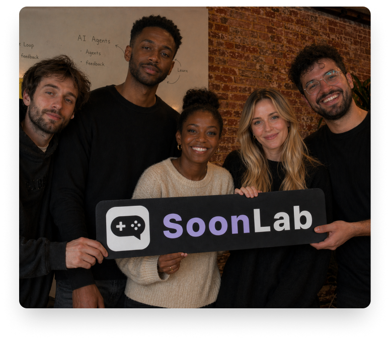 SoonLab team holding the SoonLab logo